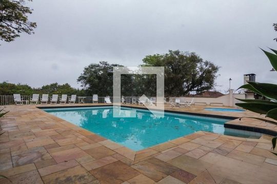 Piscina de casa de condomínio à venda com 3 quartos, 200m² em Cristal, Porto Alegre