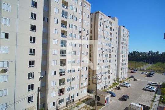 Quarto 1 - Vista de apartamento à venda com 2 quartos, 42m² em Costa E Silva, Porto Alegre