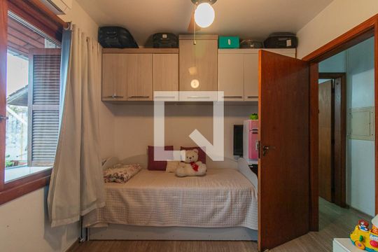 Quarto 1 de casa de condomínio à venda com 3 quartos, 126m² em Vila Nova, Porto Alegre