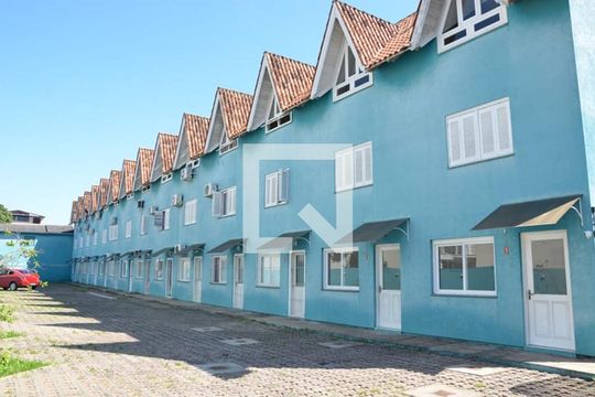 Fachada  de casa de condomínio à venda com 2 quartos, 99m² em Tristeza, Porto Alegre