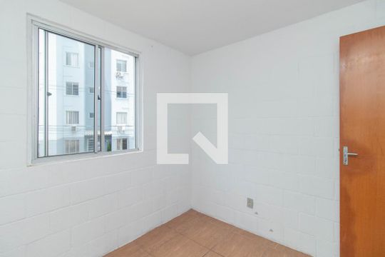 Quarto 1 de apartamento para alugar com 2 quartos, 49m² em Campo Novo, Porto Alegre
