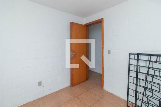Quarto 1 de apartamento para alugar com 2 quartos, 49m² em Campo Novo, Porto Alegre