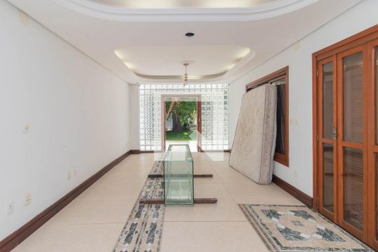 Quarto 1 de casa para alugar com 3 quartos, 341m² em Ipanema, Porto Alegre