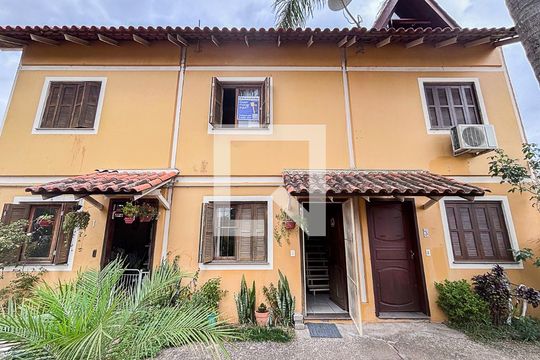 Fachada de casa de condomínio à venda com 3 quartos, 93m² em Ipanema, Porto Alegre