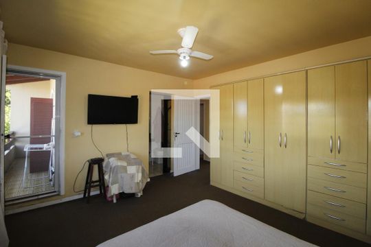 Suíte 1 de casa à venda com 5 quartos, 321m² em Jardim Sabará, Porto Alegre