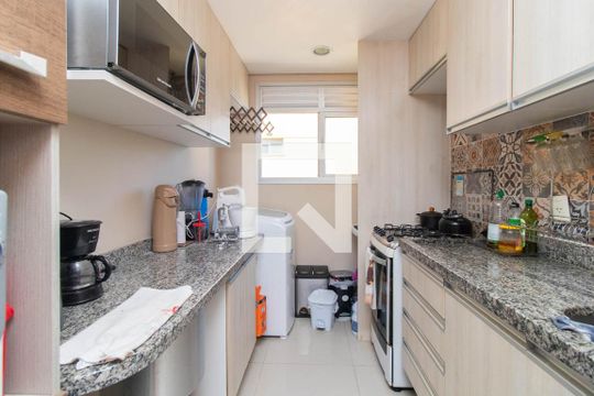 Cozinha de apartamento à venda com 2 quartos, 64m² em Nonoai, Porto Alegre