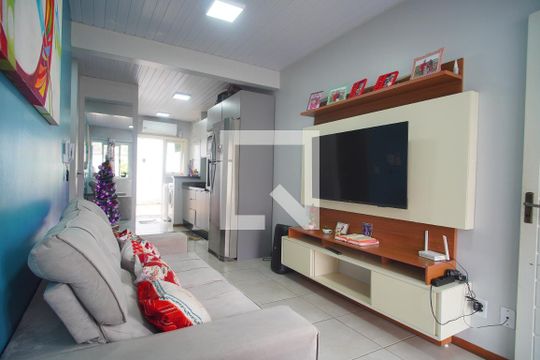 Sala de casa de condomínio à venda com 2 quartos, 48m² em Feitoria, São Leopoldo