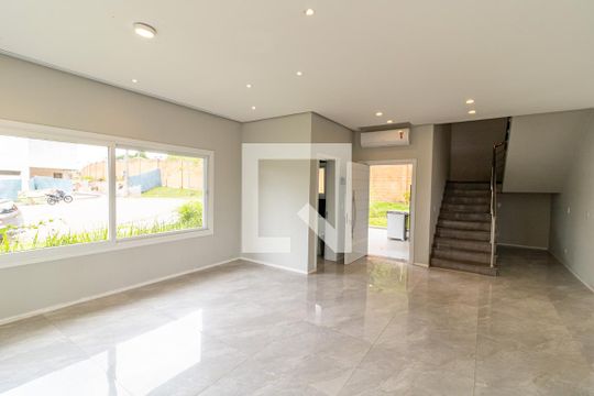 Sala de casa de condomínio à venda com 3 quartos, 248m² em Vila Nova, Porto Alegre