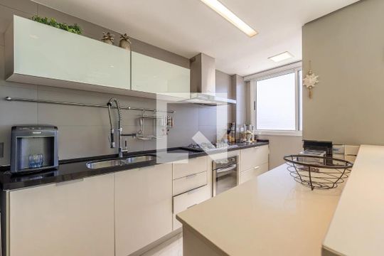 Cozinha  de apartamento à venda com 1 quarto, 94m² em Auxiliadora, Porto Alegre