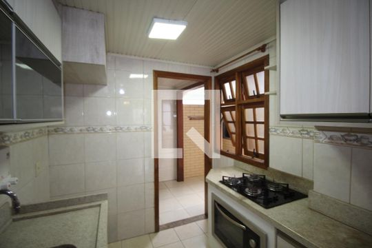 Cozinha de casa de condomínio à venda com 3 quartos, 80m² em Humaitá, Porto Alegre