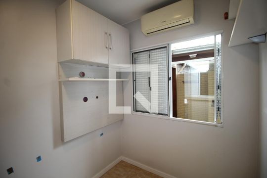 Quarto 1 de casa de condomínio à venda com 3 quartos, 80m² em Humaitá, Porto Alegre