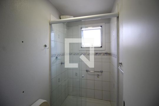 Banheiro de casa de condomínio à venda com 3 quartos, 80m² em Humaitá, Porto Alegre