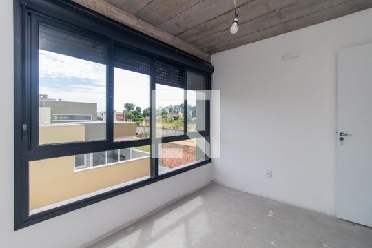 Quarto 2 de casa de condomínio à venda com 3 quartos, 120m² em Cavalhada, Porto Alegre