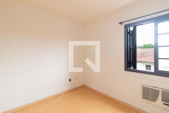 Quarto 1 de casa de condomínio para alugar com 3 quartos, 60m² em Vila Nova, Porto Alegre