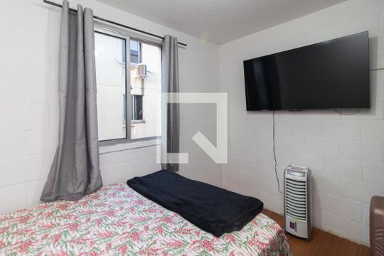 Quarto 2 de apartamento para alugar com 2 quartos, 70m² em Vila Nova, Porto Alegre
