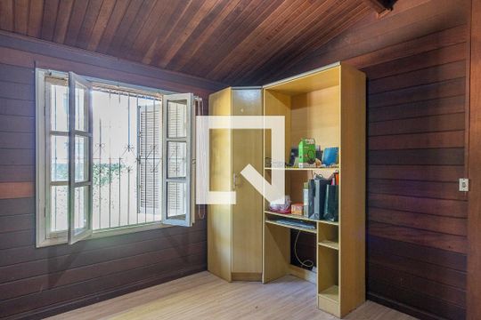 Quarto 1 de casa à venda com 3 quartos, 100m² em Parque Urbano, Porto Alegre