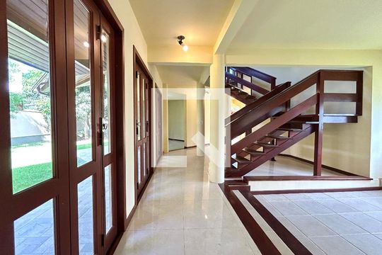 Sala 2 de casa de condomínio para alugar com 4 quartos, 385m² em Rio Tavares, Florianópolis