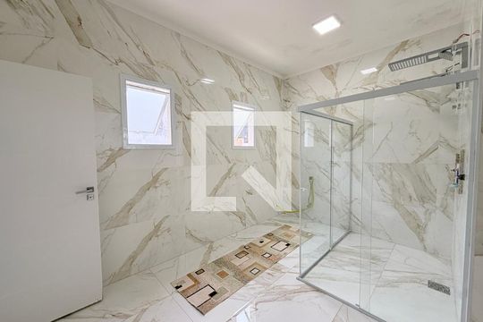 Banheiro da Suíte 1 de casa de condomínio à venda com 4 quartos, 450m² em Jardim Tarumã, Jundiaí