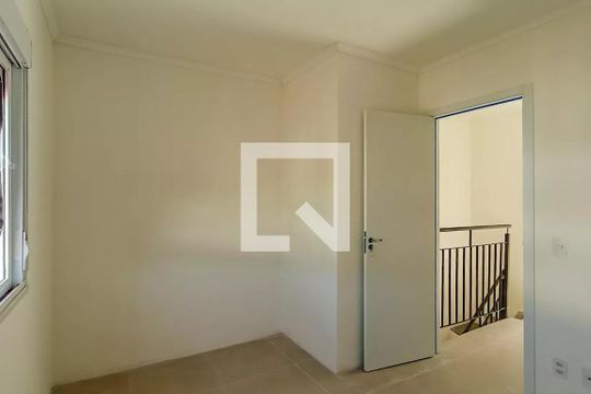 Quarto 1 de casa de condomínio para alugar com 2 quartos, 80m² em Vila Nova, Porto Alegre