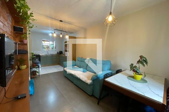 Sala de casa de condomínio à venda com 2 quartos, 105m² em Canudos, Novo Hamburgo
