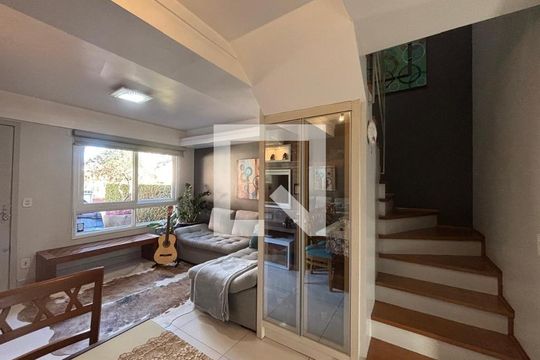 Sala de casa de condomínio à venda com 2 quartos, 115m² em Rondônia, Novo Hamburgo