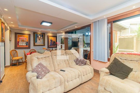 Sala de casa de condomínio à venda com 3 quartos, 180m² em Ipanema, Porto Alegre