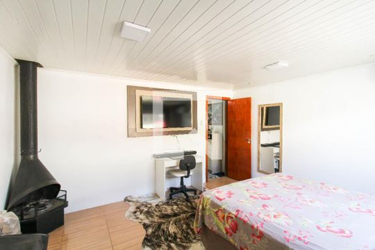 Quarto 2 de casa à venda com 4 quartos, 100m² em Guajuviras, Canoas
