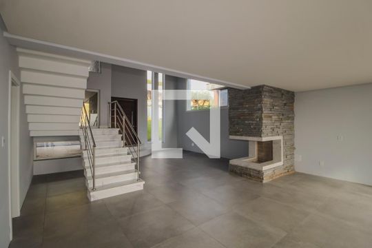 Sala de casa de condomínio à venda com 4 quartos, 286m² em Vila Nova, Porto Alegre