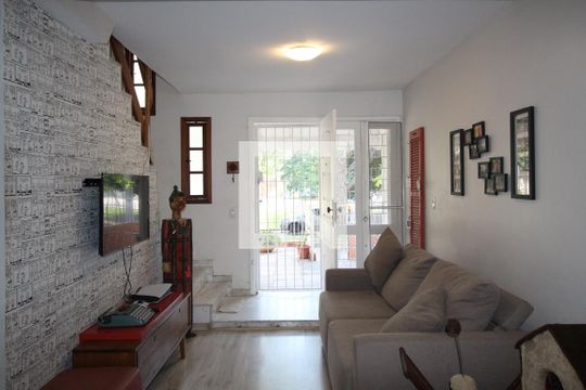 Sala de casa de condomínio à venda com 3 quartos, 126m² em Jardim Ypu, Porto Alegre
