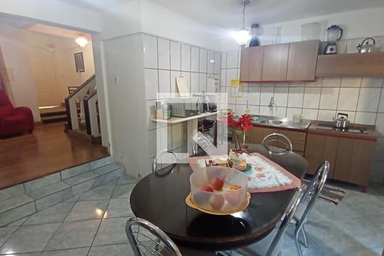 Cozinha de casa de condomínio à venda com 3 quartos, 100m² em Espírito Santo, Porto Alegre
