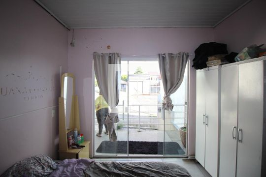 Quarto 1 de casa para alugar com 2 quartos, 126m² em Mário Quintana, Porto Alegre