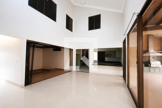 Sala de casa de condomínio para alugar com 5 quartos, 400m² em Alphaville Araguaia, Goiânia