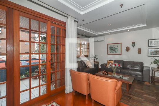 Sala de casa de condomínio à venda com 3 quartos, 234m² em Boa Vista, Porto Alegre