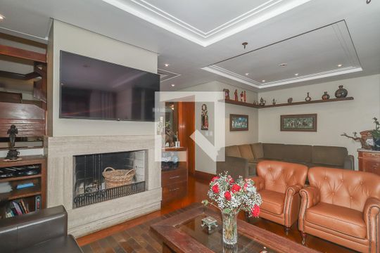 Sala de casa de condomínio à venda com 3 quartos, 234m² em Boa Vista, Porto Alegre