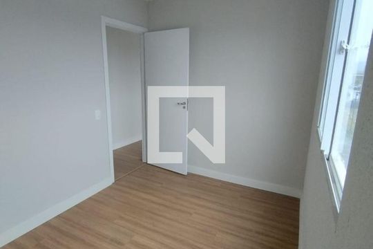 Quarto 1 de apartamento para alugar com 2 quartos, 49m² em Restinga, Porto Alegre