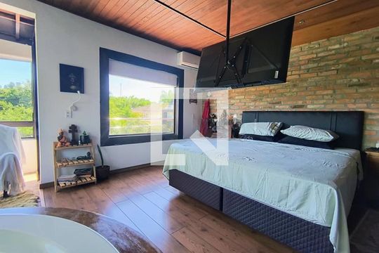 Quarto 2 de casa de condomínio para alugar com 2 quartos, 290m² em Jansen, Gravataí