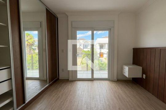 Quarto 1 de casa de condomínio para alugar com 3 quartos, 219m² em Neópolis, Gravataí