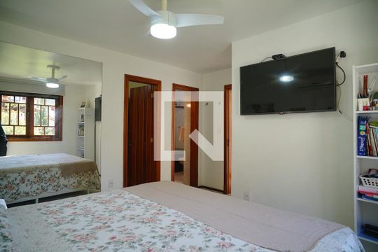 Suíte de casa de condomínio à venda com 4 quartos, 450m² em Camboinhas, Niterói