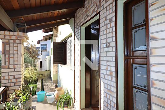 Varanda da Sala de casa à venda com 3 quartos, 115m² em Costa E Silva, Porto Alegre