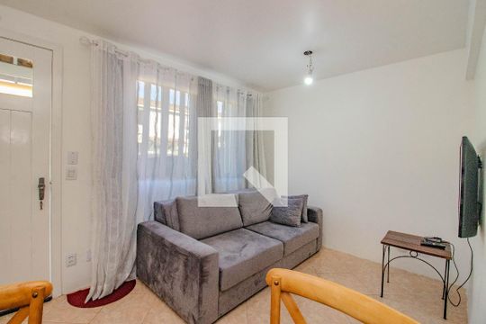Sala de casa de condomínio à venda com 3 quartos, 72m² em Sarandi, Porto Alegre