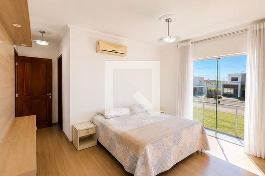 Quarto 1 de casa de condomínio para alugar com 4 quartos, 388m² em Neópolis, Gravataí