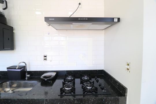 Cozinha de apartamento para alugar com 1 quarto, 28m² em Santa Mônica, Uberlândia