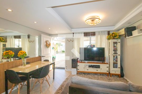 Sala de casa de condomínio à venda com 3 quartos, 89m² em Rio Branco, Canoas