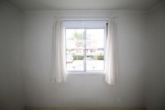Quarto 1 de apartamento para alugar com 2 quartos, 60m² em Humaitá, Porto Alegre
