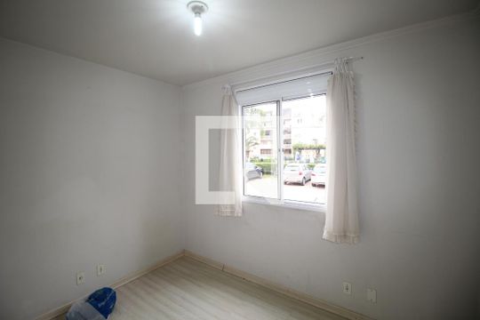 Quarto 1 de apartamento para alugar com 2 quartos, 60m² em Humaitá, Porto Alegre