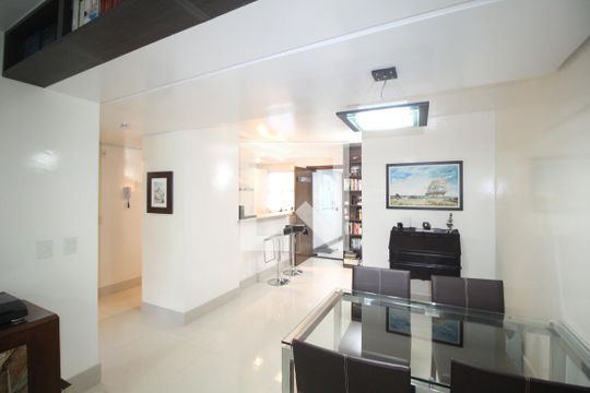 Sala de apartamento à venda com 1 quarto, 65m² em Auxiliadora, Porto Alegre