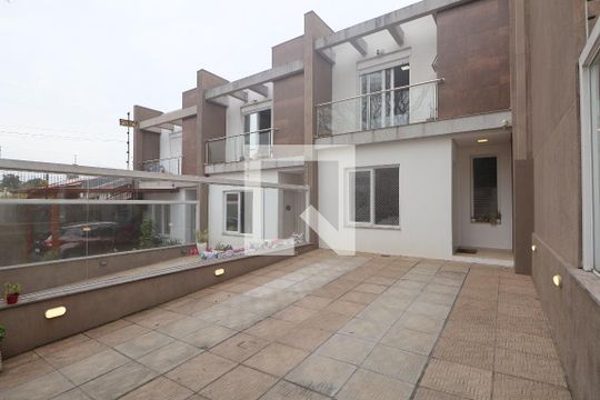 Área externa de casa para alugar com 3 quartos, 80m² em Nossa Senhora das Gracas, Canoas
