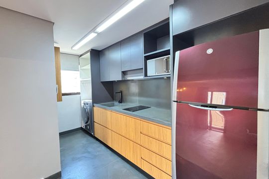 Cozinha de apartamento para alugar com 1 quarto, 95m² em Itaim Bibi, São Paulo