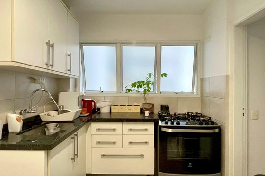 Cozinha de apartamento à venda com 2 quartos, 84m² em Jardim Paulista, São Paulo