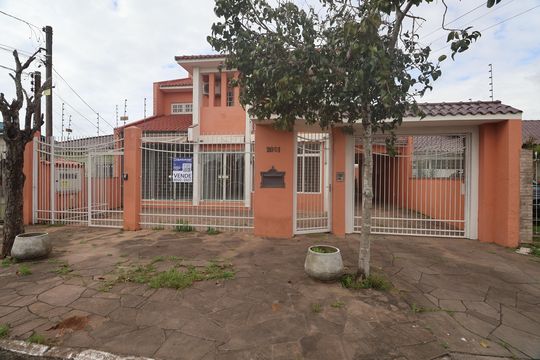 Fachada de casa à venda com 3 quartos, 315m² em Niterói, Canoas